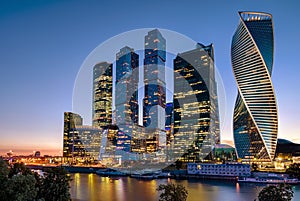 Moscow-City skyscrapers at Moskva River at night, Russia