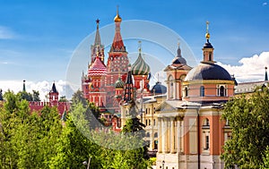 Moscow cityscape in summer, Russia. Beautiful scenic view of red St Basil`s cathedral and Moscow Kremlin in distance