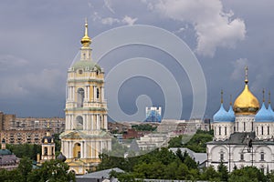 Moscow cityspace with Church and bell tower at Novospassky convent on cloudy day