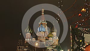 Moscow is decorated for New Year and Christmas holidays. Christmas balls on the branches of trees near the Cathedral of
