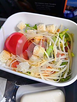 MOSCOW - 06, 2019: food on the plane on an Aeroflot flight pork with rice photo