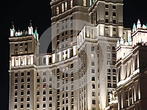 Moscow. A fragment of a high-rise building on Kotelnicheskaya embankment. Night view from the Moscow river