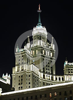 Moscow. A fragment of a high-rise building on Kotelnicheskaya embankment. Night view from the Moscow river