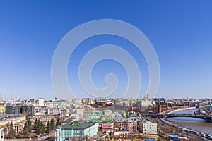 Moscow Kremlin and the bell tower of Ivan the Great and Russian weapons with moscow cityscape, Moscow, Russia