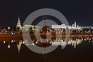 Moscow Kremlin at night with reflection on the water of Moskva river