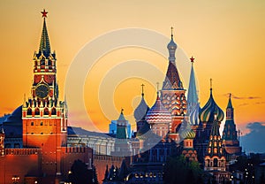 The Moscow Kremlin and St. Basil's Cathedral on Red Square in Moscow, Russia. Landscape at sunset.