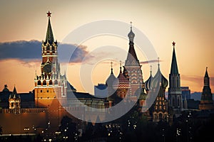 The Moscow Kremlin and St. Basil's Cathedral on Red Square in Moscow, Russia. Landscape at sunset.