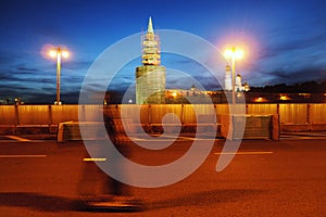 Moscow Kremlin at sunset and the Moscow river embankment.