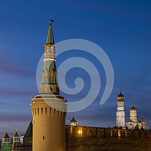 Moscow Kremlin towers and Ivan the Great bell tower in blue hour after sunset