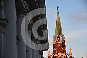Moscow Kremlin, Trinity tower and Manege. Blue sky background.