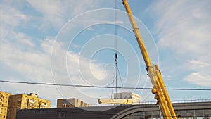 Moscow metro construction site. Cranes working and trains going through. Renovation