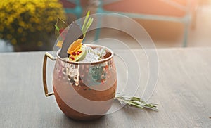 Moscow mule cocktail served on restaurant table