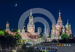 Moscow night cityscape with Cathedral of Vasily the Blessed Saint Basil`s Cathedral and Spasskaya Tower of Moscow Kremlin on Re