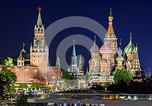 Moscow night cityscape with Cathedral of Vasily the Blessed Saint Basil`s Cathedral and Spasskaya Tower of Moscow Kremlin on Re