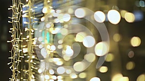Moscow. Night. Lights of glowing garlands on the streets of the city. Christmas decorations showcases shops and streets