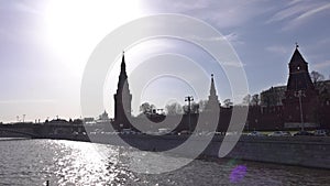 Moscow river and Kremlin silhouette on a sunny day as seen from the boat