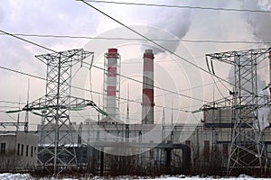 Moscow, Russia, 2018: Combined heat and power plant / Thermal power plant / Power Transmission Supports / Powerline tower