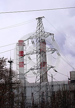 Moscow, Russia, 2018: Combined heat and power plant / Thermal power plant / Power Transmission Supports / Powerline tower