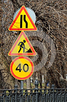 Moscow, Russia, April, 15, 2017. Temporary road signs `road narrows ahead`, `Road works`, `speed Limit 40 km/h` on Chistoprudny Bo