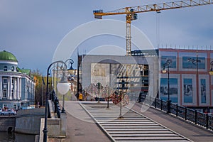 MOSCOW, RUSSIA- APRIL, 24, 2018: Beautiful outdoor view of colorful wedding padlocks on a metal tree over a bridge