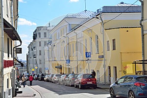 Moscow, Russia, April, 15, 2017.  Casr are parked in the B. Spasoglinischevsky lane near the house of A. I. Uvarov, 1793-1802 year