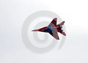 Multipurpose highly maneuverable MiG-29 fighter from the Strizhi aerobatic team over the Myachkovo airfield photo