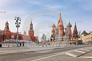 Panoramic view of Moscow Kremlin with Spassky Tower and Saint Basil's Cathedral in center city on Red Square, Moscow