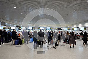 Passengers in the terminal of the Domodedovo International Airport in Moscow