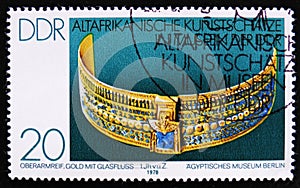 MOSCOW, RUSSIA - APRIL 2, 2017: A post stamp printed in DDR (germany) shows a golden neckle with treasure stones, the series