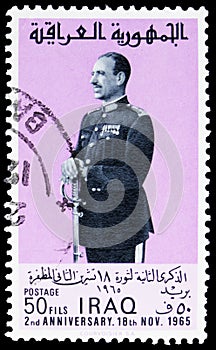 Postage stamp printed in Iraq shows Abdas Mohammed Salam Aref 1920-1966, president of the Repu, 2nd anniversary of the 18th