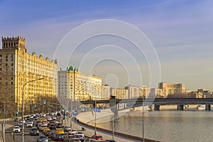 Traffic jam on embankment moskva river in Moscow city russia, sunset time