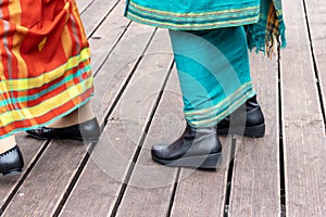 Moscow, Russia - August 02, 2019: Indonesian women wearing traditional clothes dancing together during national asian festival