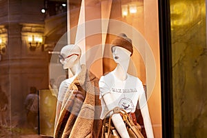 MOSCOW, RUSSIA - AUGUST 10, 2021: Fashionable women mannequins in trendy casual Max Mara clothes on the clothing retail store