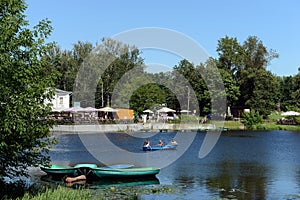 People go boating in the natural-historical park `Kuzminki-Lublino`