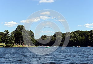 People go boating in the natural-historical park `Kuzminki-Lublino`.