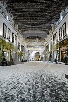 Moscow, Russia - December 17, 2022: Tretyakovsky passage in the center of Moscow is decorated with New Year and Christmas