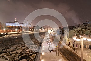 Moscow, Russia - December 27, 2022: Cold and deserted Moscow street on a snowy winter evening