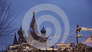 MOSCOW, RUSSIA - DECEMBER 6: Christmas fair on red square, view of St. Basil`s Cathedral