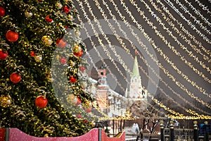 Moscow, Russia - December 7, 2022: Big Christmas tree. New Year decorations and Christmas atmosphere on a winter street in Moscow