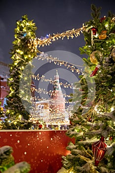 Moscow, Russia - December 7, 2022: Big Christmas tree. New Year decorations and Christmas atmosphere on a winter street in Moscow