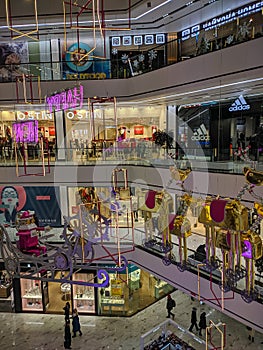 A large shopping center is decorated with New Year`s toys