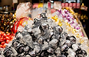 Moscow, Russia, February 2021: A bunch of assorted lindt chocolates with different fillings. Sale in a branded candy store