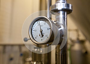 MOSCOW, RUSSIA. 07 February 2018: Pressure gauge manometer of white metal - brewing equipment.