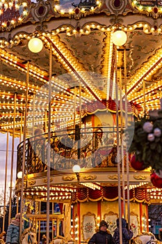 Moscow, Russia, 2020.01.01: Festive carousel on Christmas holidays in the city square.