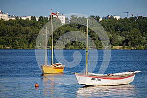 Moscow, Russia - July 01, 2022: a boat with a stowed sail is on the water