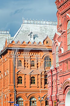 Fragment of a beautiful historical red brick building of the city of Moscow. Vertical photo.