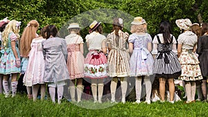 MOSCOW, RUSSIA-JUNE 1. dressing up girls in carnival clothes dolls in Moscow on June 1, 2013. apple orchard in Kolomenskoye park