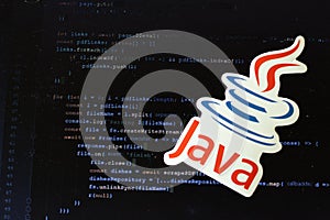 Moscow, Russia - 1 June 2020: Java logo sign with program code on background Illustrative Editorial