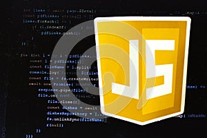 Moscow, Russia - 1 June 2020: JavaScript JS logo sign with program code on background Illustrative Editorial