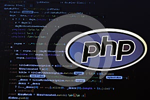 Moscow, Russia - 1 June 2020: PHP logo sign with program code on background Illustrative Editorial